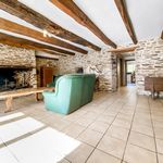 Terraced stone house with large garden, a well and stone outbuilding