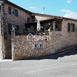 Maison de caractère en pierre d'une superficie de 129M2 en bordure de village