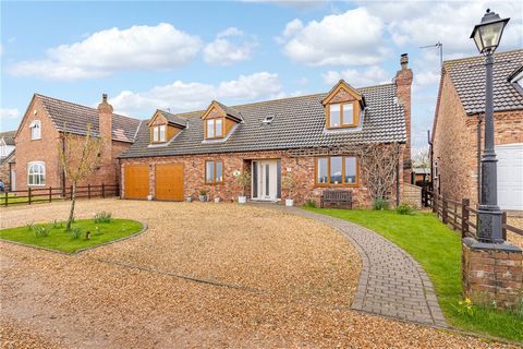In an ideal position for raising a family, this deceptively large, well presented, 4 - potentially 5 - bedroom home offers the best of both worlds as it sits in a quiet spot overlooking countryside in a very well served and highly sought after town j...