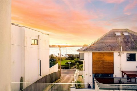 Beach life is on your doorstep at this very charming home in Sandbanks where every day feels like a holiday! Uniquely situated to take advantage of Harbour Views from the terrace and just steps away from a beautiful sandy Blue Flag beach this detache...