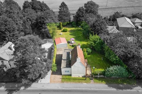PROPERTY DESCRIPTION A delightful two / three-bedroom detached grade ll listed cottage situated within 0.28 acres and backing on to open countryside. The property is set within a gated driveway with plenty of parking, detached double garage and fabul...