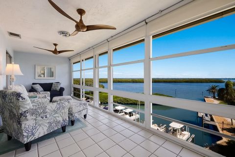 Under contract-accepting backup offers. PRICE REDUCTION OF $105,100! BEST VALUE in WINDWARD BAY PENTHOUSE! MOTIVATED SELLER! 40 FEET of DIRECT WATERFRONT VIEWS of Sarasota Bay! This FURNISHED CORNER PENTHOUSE offers the LARGEST square footage availab...