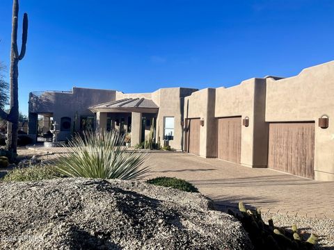 Welcome to The Monument Troon North! $300k Extensive Remodel! Crisp, Clean, and Contemporary style with 365 degree views that are stunning from every angle, especially from the rooftop patio overlooking Pinnacle Peak Mountain and evening city lights ...