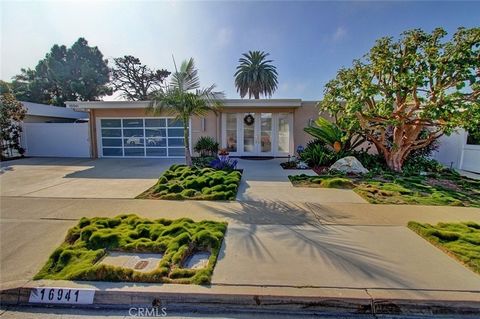 This is the home you have been waiting for! Step into this mid-century home experience nearly 2000 square feet of luxurious single -story living! As you enter through a charming atrium you ll be welcome by a spaciuos lining and dinning room,featuring...