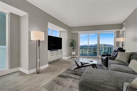 Experience luxury living on the 35th floor of Sky Tower on the Las Vegas Strip in this stunning two-bedroom, two-bathroom residence. Enjoy sweeping views of the city skyline from an expansive private balcony, perfect for unwinding or entertaining gue...