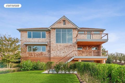 Welcome to 451 Dune Road, a newly completed coastal masterpiece set on 0.70 acres with over 90 feet of pristine ocean frontage. This 4,000-square-foot home offers meticulously designed interiors with premium finishes throughout. The gourmet kitchen f...