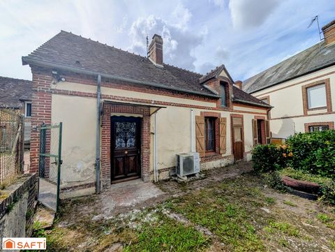 Maison de plain-pied à rénover avec jardin et garage