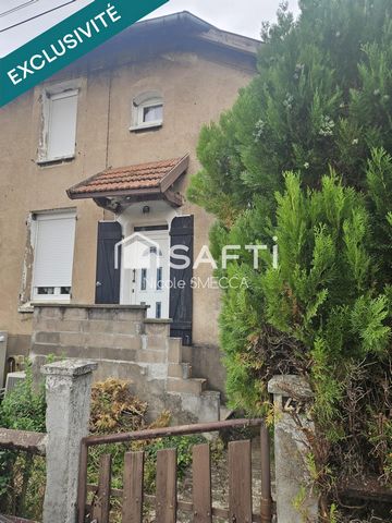 Maison mitoyenne 4 pièces,2 chambres,garage,jardin