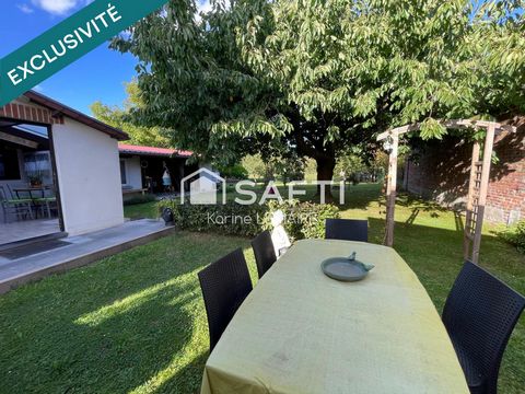 Maison individuelle avec garage et jardin