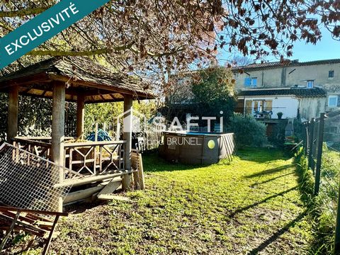 Maison mitoyenne avec terrain, terrasses et garage