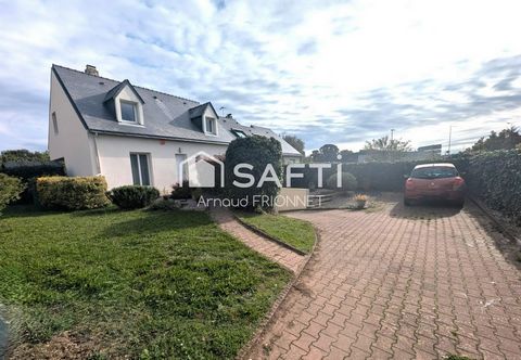 Grande maison composée de 5 chambres sur sous sol et agréable jardin.