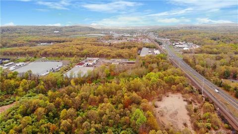 Prime Location. 67 acres of vacant land with development potential. Easy access to interstate I-91 and RT 5. Zoned light industrial. Within this zone there are many permittable uses including: trucking facilities, self-storage, assistant living facil...