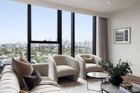 Le summum du style de vie et du luxe est ce grand appartement sous-penthouse nord-ouest baigné de lumière avec des baies vitrées, offrant une vue imprenable sur les toits de Melbourne et la baie de Port Phillip. L’espace de vie décloisonné avec parqu...