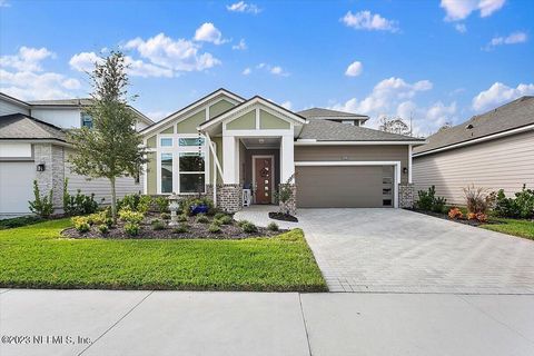 Welcome to this luxurious zero energy turn-key luxury home in E-Town. Providence Home's Tarpon Floorplan that has been expanded and equipped with over $220,000 in luxurious options and upgrades. High-end finishes abound in every room. 4 bedrooms, 4 f...