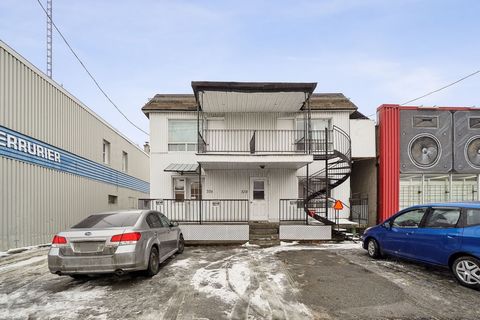 Room building and commercial spaces located in Laval, close to all services and amenities. Annual income $58,536 and possibility of increasing income. INCLUSIONS -- EXCLUSIONS --