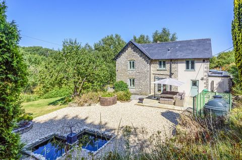 An exceptional stone built period four bedroom country property with a small, wooded paddock, surrounded by fields and woodland, and very secluded and private, in the Mendip Hills, but only 7.2 miles from Wells and 12.6 miles from Georgian Bath. Tota...