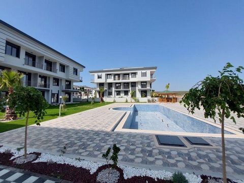 Brand new homes for whom are looking to have a home in the sunshine for all year around.  The complex is located in Didim Altinkum, Turkey and just finished and it's ready to move for 2024 now. 2 bed 1 bath a living room with kitchen and balconies an...