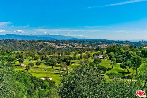 Mountaingate in Brentwood - Sensational Views and the sweet smell of jasmine welcomes you to this rarely found 4BR 3.50 BA Villa with one of the most breathtaking settings in LA! Overlooking panoramic 180' City, Fairway and Mountain Views, this premi...