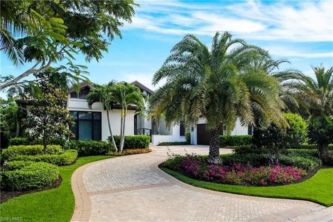 Undeniably one of the most sought after neighborhoods is the Moorings located west of 41 between Park Shore and Old Naples. This 2015 model home has irresistible appeal, the upgrades dominates the trends for today's buyer. Impressive curb appeal at f...