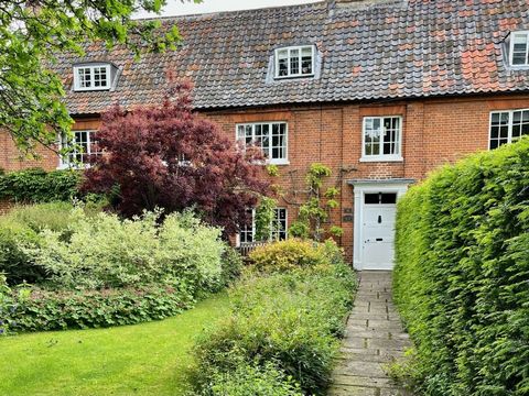 This pretty Grade II listed cottage stands proudly in the middle of a row of attractive period homes, set well back behind a long, south-facing garden in the heart of a popular Norfolk village. Within easy reach of Norwich but enjoying a traditional ...