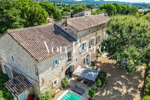 Located in the town of Paradou, just 2 minutes from Les Baux-de-Provence, this property, dating back to 1724, seamlessly blends authentic charm with modernity. This prestigious residence, spanning 2 floors above ground and a ground floor, offers a un...