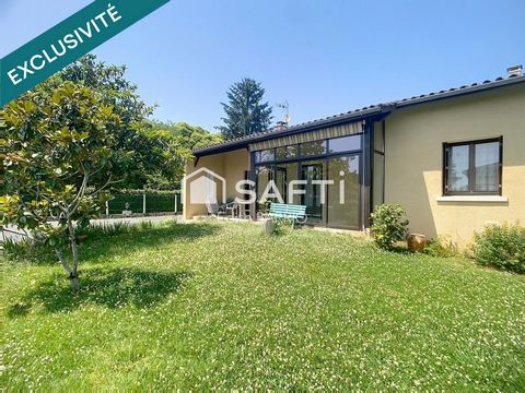 Grande maison de plain pied avec garage et jardin très paisible
