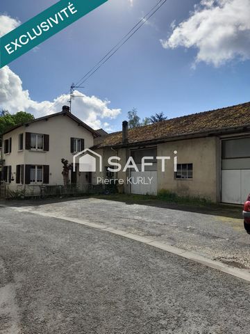 A saisir maison avec grand garage