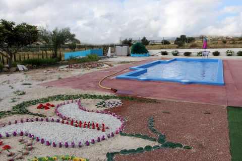 Farm with organic cultivation of fruit trees, apple trees, grapefruits etc, as well as pistachio trees, hazelnuts, walnuts and almond trees, surrounded by centenary olive trees. With wonderful views of the mountain and pool surrounded by a garden car...