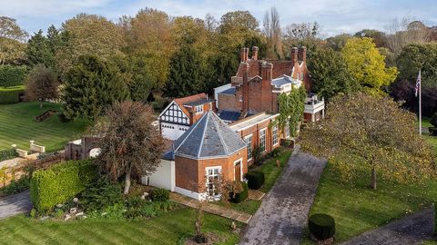 A stunning 18th Century Grade II* listed 8 bedroom family home steeped in history and sited on 5.5 acres of paddock and landscaped gardens adjacent to the River Thames. Approached via a private gated entrance, the house is hidden from public view by ...