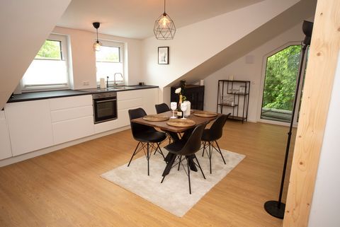 We warmly welcome you to our newly-built vacation apartment located near the heart of Bayreuth. Our modern attic accommodation is designed to provide you with a comfortable and relaxing retreat during your stay. You can enjoy the beautiful design, an...