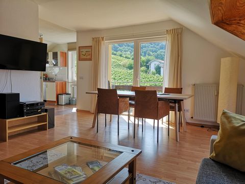 The 3-room apartment Weinbergblick with 85 sqm is very modernly furnished and consists of a large bright kitchen-living room. The apartment is modern and stylishly furnished. It has 2 bedrooms for a total of 4 persons. From the living room and the ba...