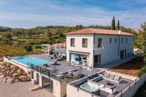 This exclusive villa is located in the interior of Istria, near the beautiful town of Motovun, surrounded by greenery and vineyards. It is located in a dominant position with a panoramic view of the surroundings and the slopes, with complete infrastr...