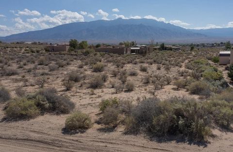 Half acre lot in the highly desired Rio Rancho area. This lot is surrounded by custom homes with beautiful views of our Sandia Mountians. Ideal for building your dream home, all utilities are right near the lot making it easier to build. Just minutes...