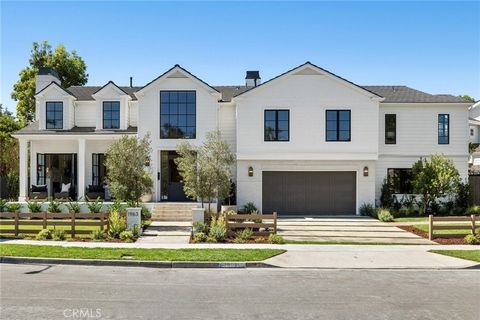 Discover a stunning re-imagined 2024 custom single-family residence nestled in the serene neighborhood of the Port Streets. Located on a spacious corner lot spanning 9,000 sqft, the home offers a tranquil retreat with 5,306 sqft of living space. No e...