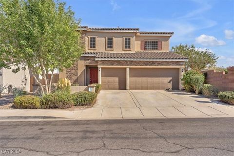 Beautiful Move-In Ready Henderson home with dual primary suites- on on each level- spacious loft, 3 car garage and swimming pool! Freshly painted throughout, with open-concept kitchen with stainless steel appliances, breakfast bar, and beautiful chef...