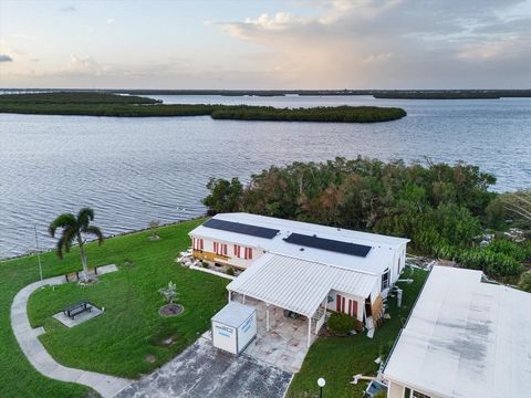 Discover the potential of this charming fixer-upper mobile home in River Forest village. 55+ community, perfectly situated in the community along the shores of Charlotte Harbor and minutes from Downtown Punta Gorda. With breathtaking waterfront views...