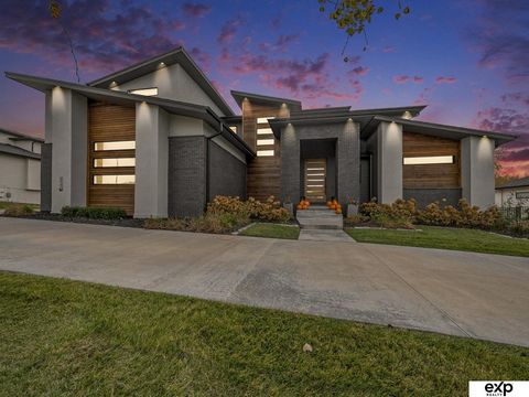 A Modern Masterpiece in Blue Sage This exceptional Elkhorn residence in the prestigious Blue Sage community redefines luxury living for the high-performance individual. Sleek lines, bold shapes, and a refined color palette create a striking and sophi...