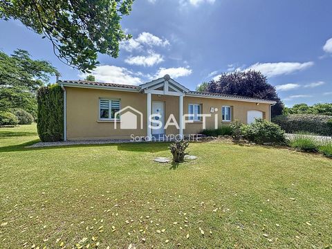 Jolie maison de 84 m2 avec un grand garage et un jardin arboré