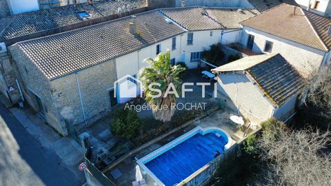 Grande bâtisse + 500m2 garage 190m2 + grenier 150m2 au centre de Magalas