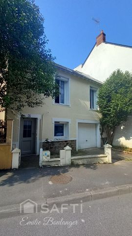Maison de charme avec jardin, garage et véranda