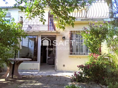 Maison familiale de 93 m² avec jardin arboré et véranda