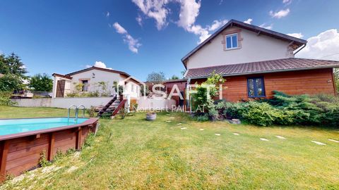 Maison familiale alliant la pierre et le bois
