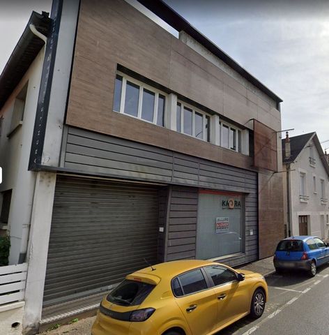 Bâtiment professionnel avec 20 parkings.