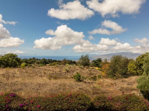 2.1 acres of vacant land in the Kula Glen subdivision. Ocean and Mountain views with varied topography ranging from level to steep. There is no county water meter to the property.