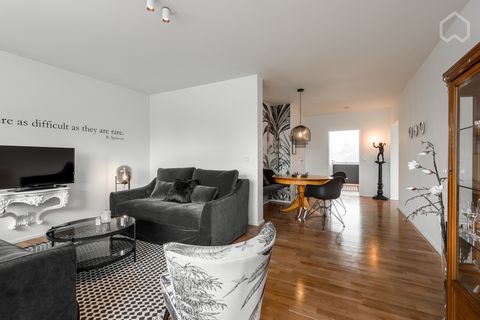 Generously cut, light-flooded apartment, stylishly renovated in 2021 and lovingly furnished with a beautiful balcony and a wide, unobstructed view from the 4th floor (elevator) in a well-kept apartment building, in an extremely central, yet quiet loc...