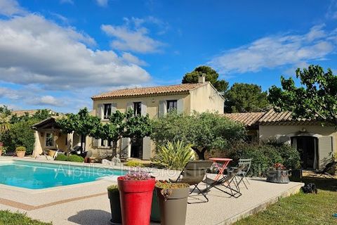 A few minutes walk from the center of Eygalières, At the end of a private way, quiet surrounding, Lovely bright, friendly, functional bastide enjoying a very nice view of the Alpilles. It offers on the ground floor an entrance hall with guest toilet,...