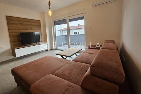 Rijeka, Srdoči, fully equipped four-room penthouse of 116 m2 with 2 parking spaces. The apartment consists of an open space kitchen with a dining room and a living room that open onto a spacious terrace, a guest toilet, a laundry room, and a separate...