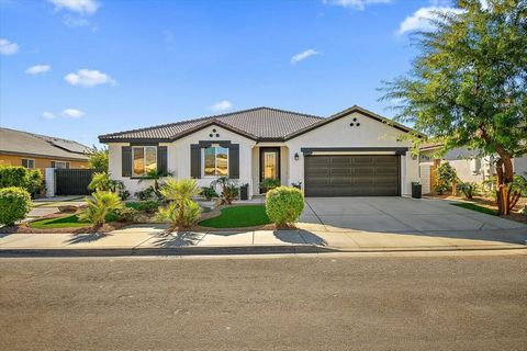 Welcome to your dream oasis in the coveted Whittier Ranch subdivision of Indio! This 3BR plus den, 2BA gem is a masterpiece of modern luxury and comfort. Step inside and be greeted by the upgraded features, including stunning quartz counters, a styli...