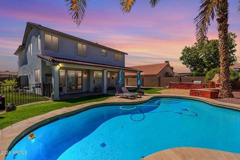 Beautifully updated 4 bedroom, 3 bath home with a pool in a prime Chandler location—no HOA! With a new roof, high-efficiency HVAC units, and solar, this home is a must-see. It boasts a formal living and dining area, a spacious family room with a gas ...