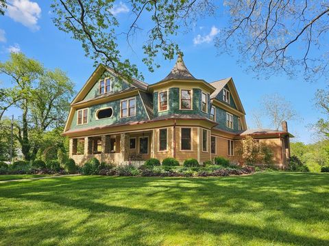 The Alden and Thomasene Howell House, iconic NC estate on the National Register of Historic Places. Built in 1905 on a ridge overlooking Waynesville known as Millionaires Row, the 2.5 story, 4BR/3BA home offers stunning views of Mount Lyn Lowry and t...